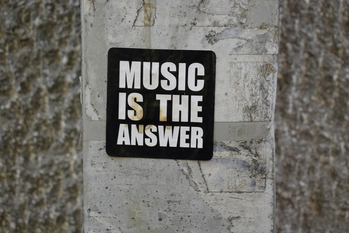 Music is the answer sign 