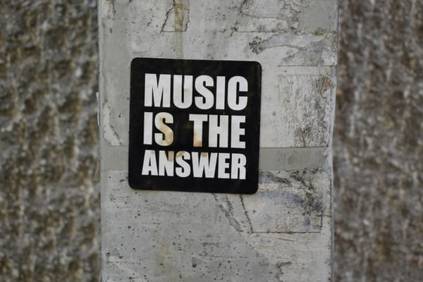 Music is the answer sign 